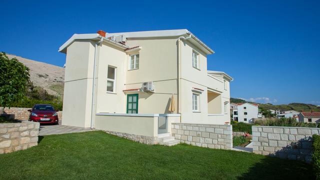 Kuća i vrt Apartmana Pag Fabijanić